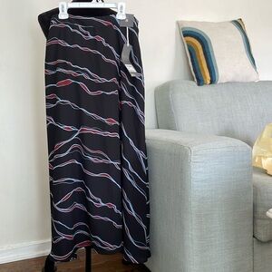 Black midi skirt with light blue and burgundy accents